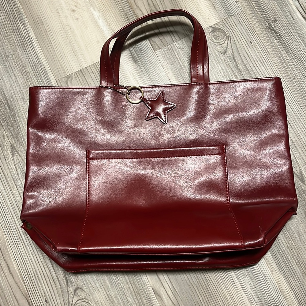 Estée Lauder red bag